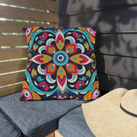 Thumbnail for Colorful patterned pillow on a bench with a straw hat nearby