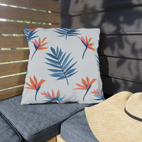 Thumbnail for Decorative pillow with tropical leaf pattern on a wooden bench
