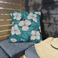 Thumbnail for Floral pillow on a bench with a straw hat nearby