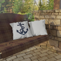 Thumbnail for Pillow with anchor design on a wooden swing against a stone wall and greenery background