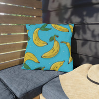 Thumbnail for Pillow with banana pattern on a wooden bench